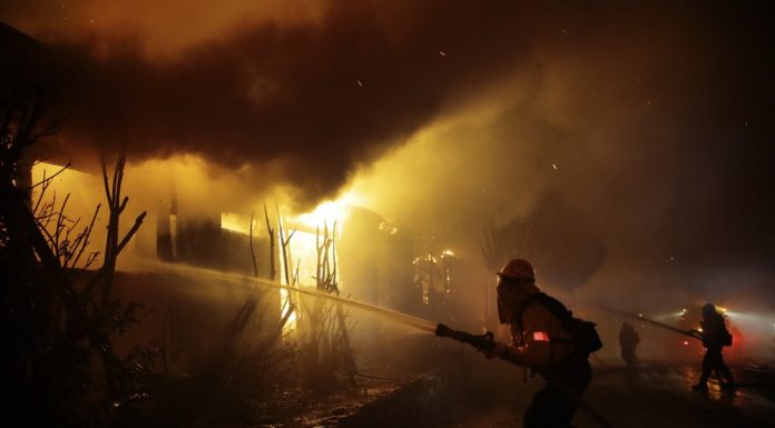 California wildfires erupt in LA, burn in wine country