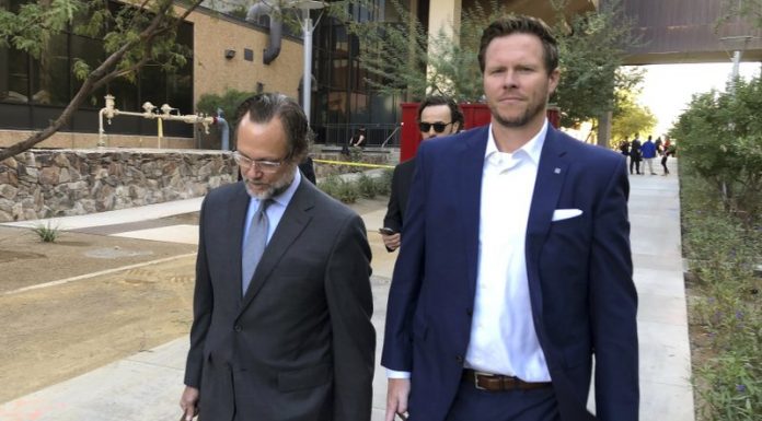 Official pleads not guilty in alleged human smuggling scheme