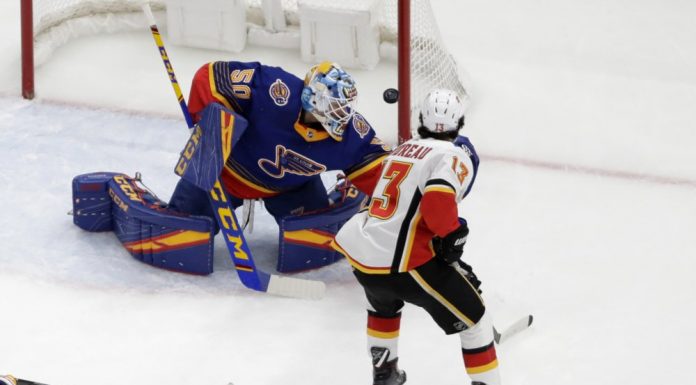 Binnington makes 40 saves to help Blues beat Flames 5-0