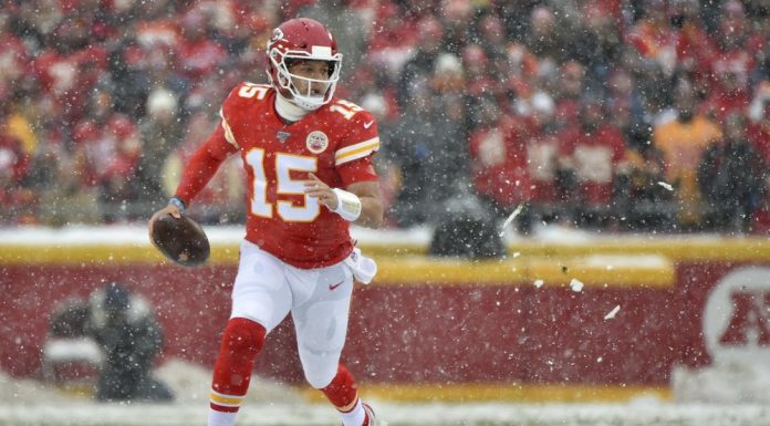 Chiefs roll to 23-3 victory over Broncos at snowy Arrowhead