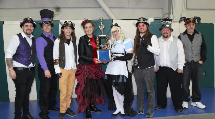 Same team wins Trivia Night traveling trophy, table decorating contest