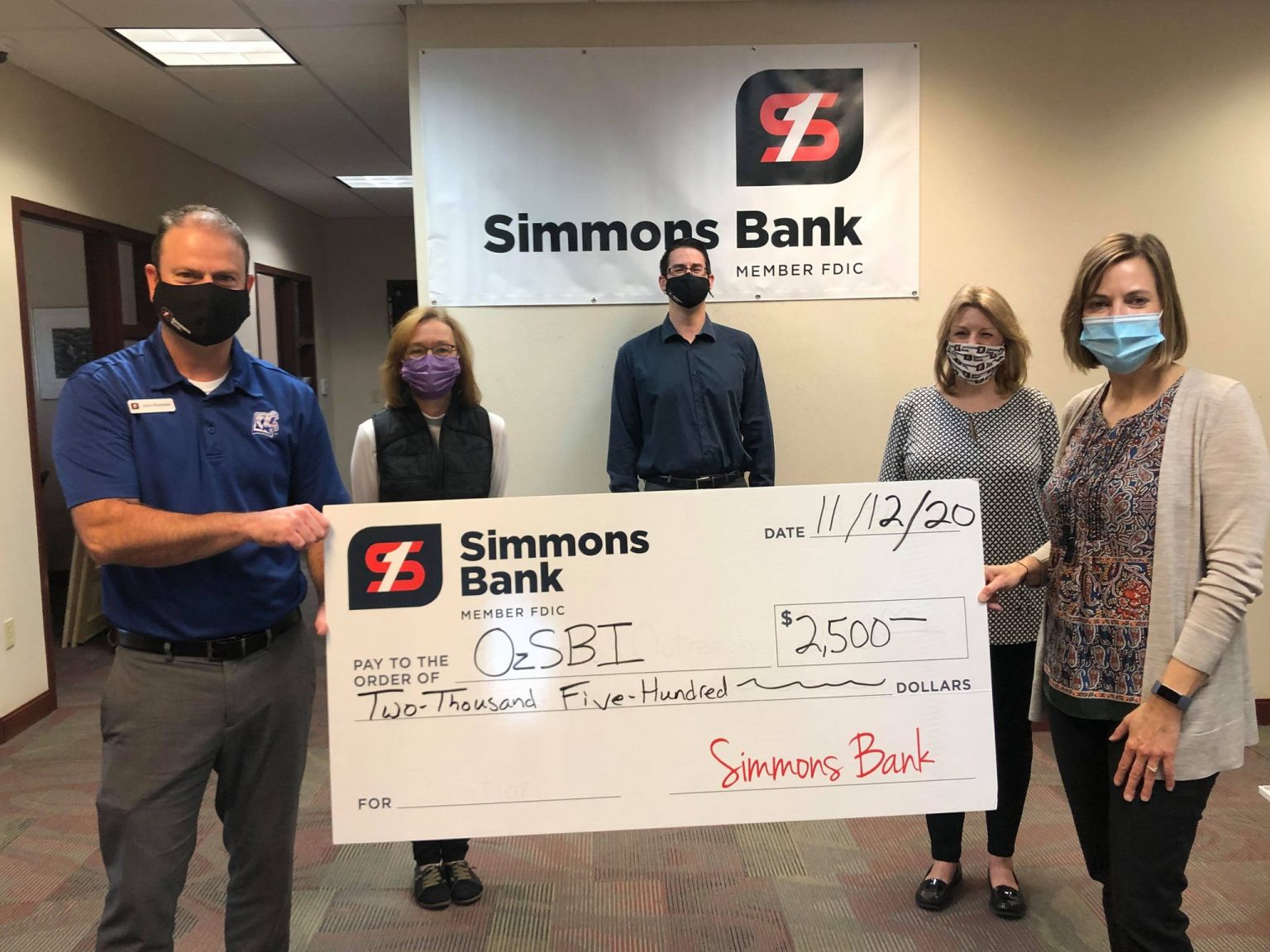 OzSBI receives donation from Simmons Bank Ozark Radio News