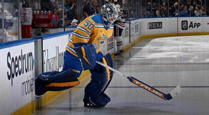 Thomas scores 28 seconds into OT for Blues in win against Flames
