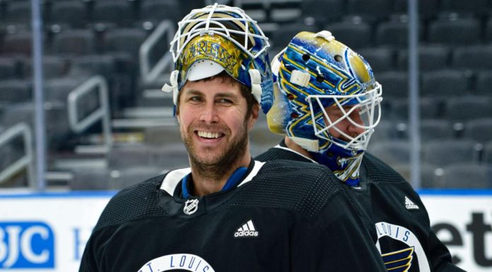 Dube scores twice in 3rd period, Flames defeat Blues