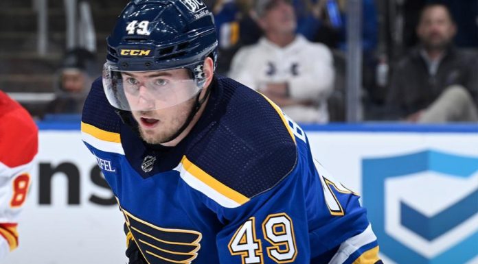 Binnington makes 34 saves, Blues cool off Devils