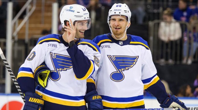 Canucks defeat Blues in OT after tying it in final minute
