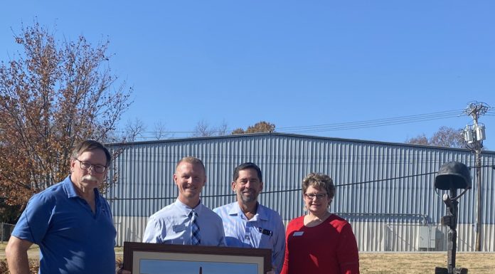 Howell-Oregon Electric Co-op Donates Painting to West Plains High School