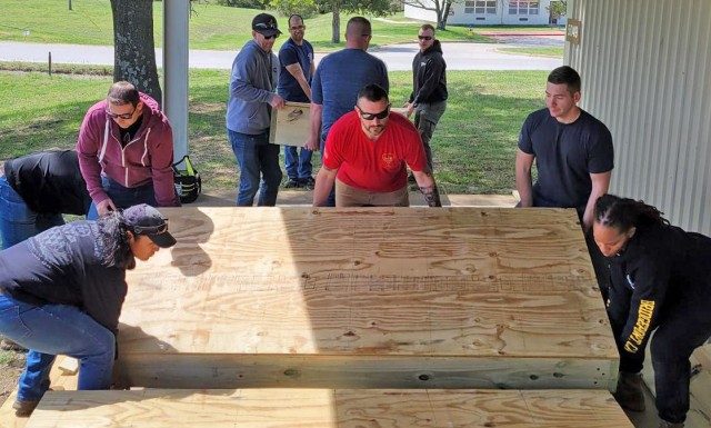 Soldiers with Fort Leonard Wood Build Portable Stage for Plato Highschool