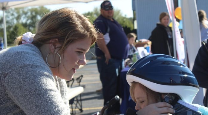 WP FCCLA, Optimist Club hand out bike helmets