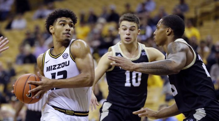 Missouri uses stingy defense to smother Wofford 75-56