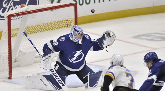 Sundqvist scores 2 before injury, Blues beat Lightning 4-3