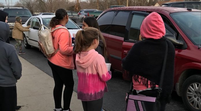 Middle school students participate in coffee community service project