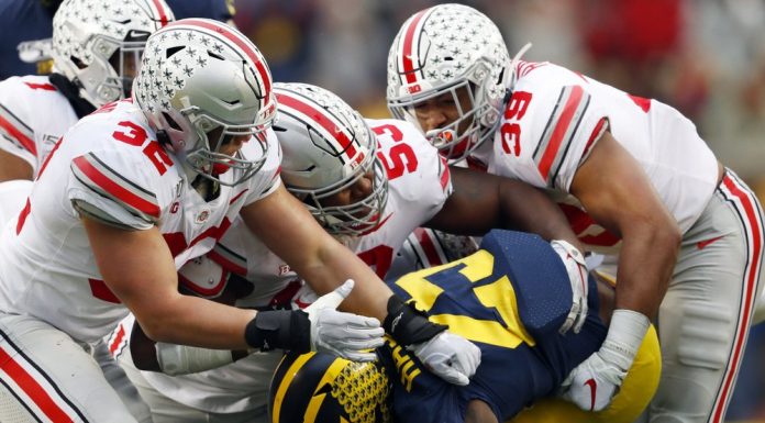 No. 2 Ohio State beats No. 10 Michigan 56-27 for record run