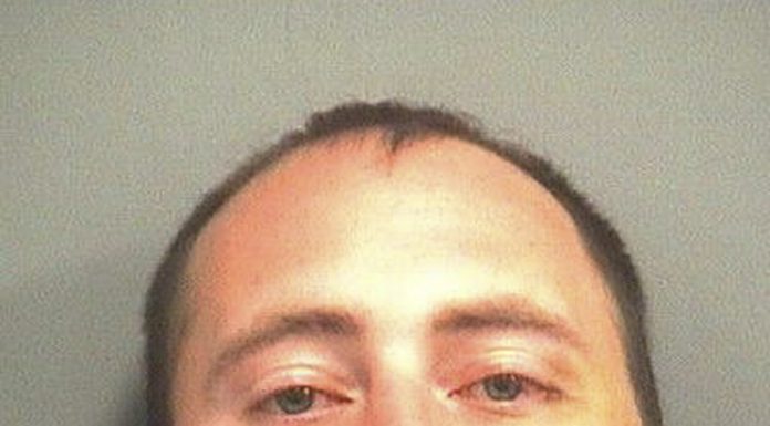 Arkansas authorities: Slain cop shot 10 times in head