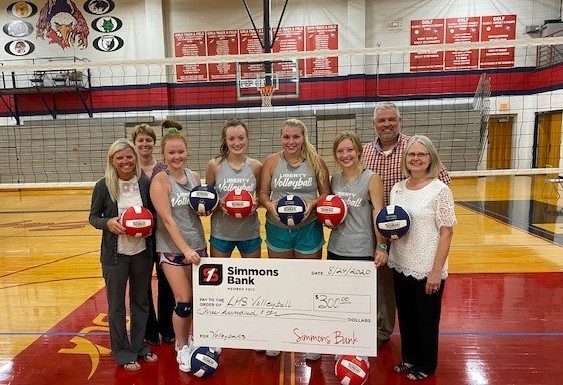 Simmons Bank-Mountain View makes donation for volleyballs to LHS