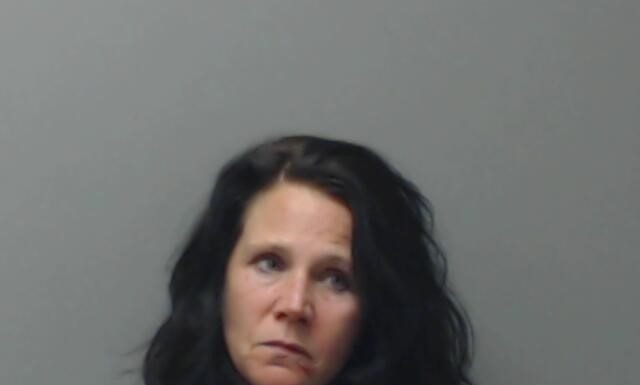 Woman crashes car into residence with children inside