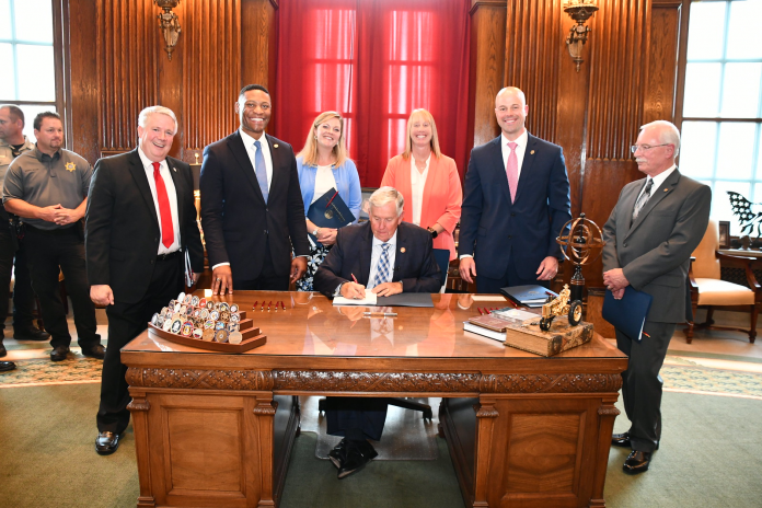 Evans bills signing