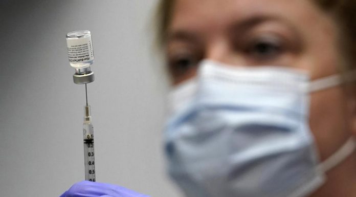 AP News: US regulators give full approval to Pfizer COVID-19 vaccine