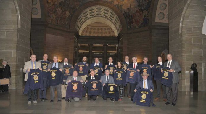 State Rep. Bennie Cook and others show their support for FFA