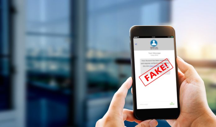 Fake Text message SMS scam or phishing concept.