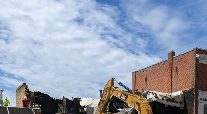 Deconstruction of Fire-Damaged Main Street Building Begins today.