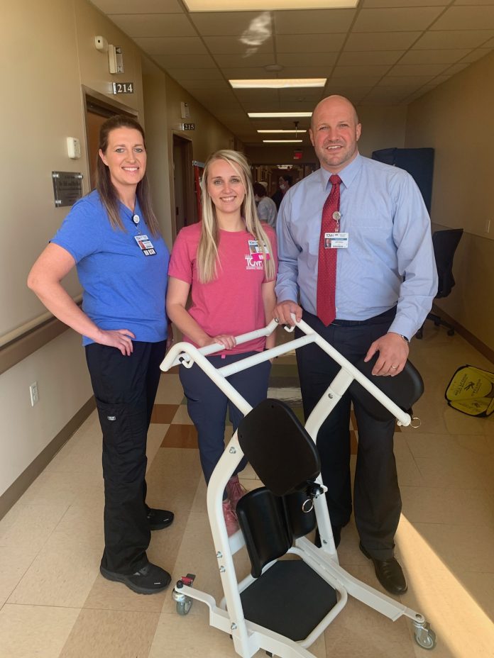 Shelly Jeff with patient lift assist 8.23