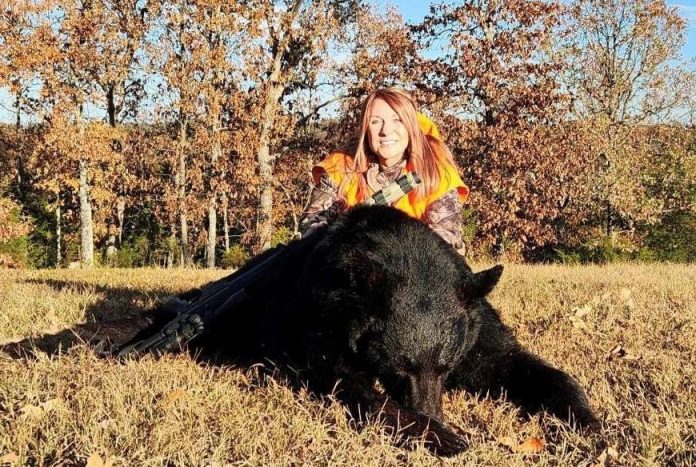 Ava Resident With Bear