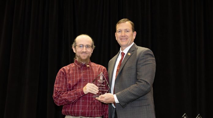 Biff Bird receives Excellence in University Service Award from MSU