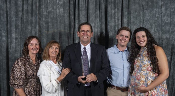 Singletary Presented Distinguished Service Award