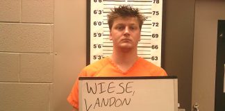 Squires man charged with child enticement