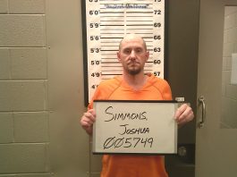 Man charged after motorcycle pursuit, patrol car collision