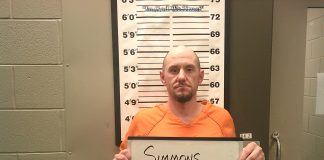 Man charged after motorcycle pursuit, patrol car collision