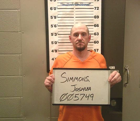 Man charged after motorcycle pursuit, patrol car collision