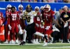 Football Pulls Away in 38-21 Border War Victory over Kansas